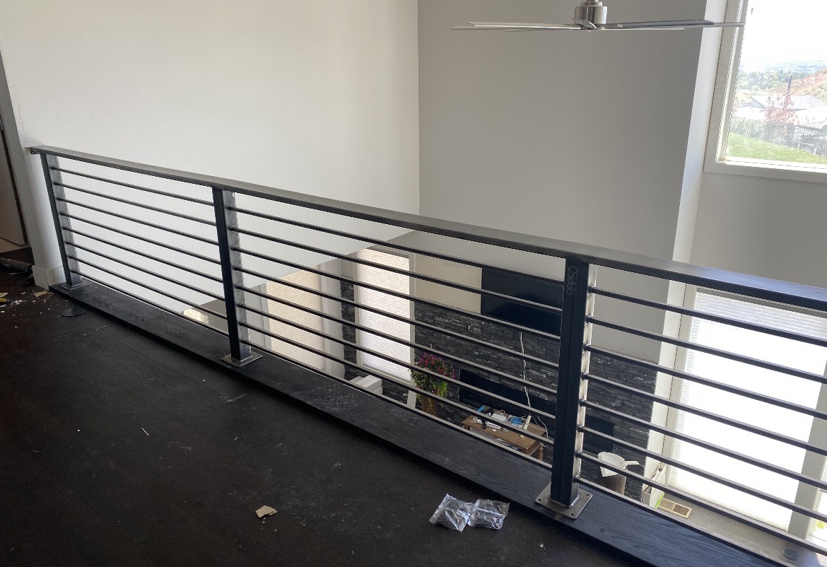 Freshly welded residential handrail on a Treasure Valley home